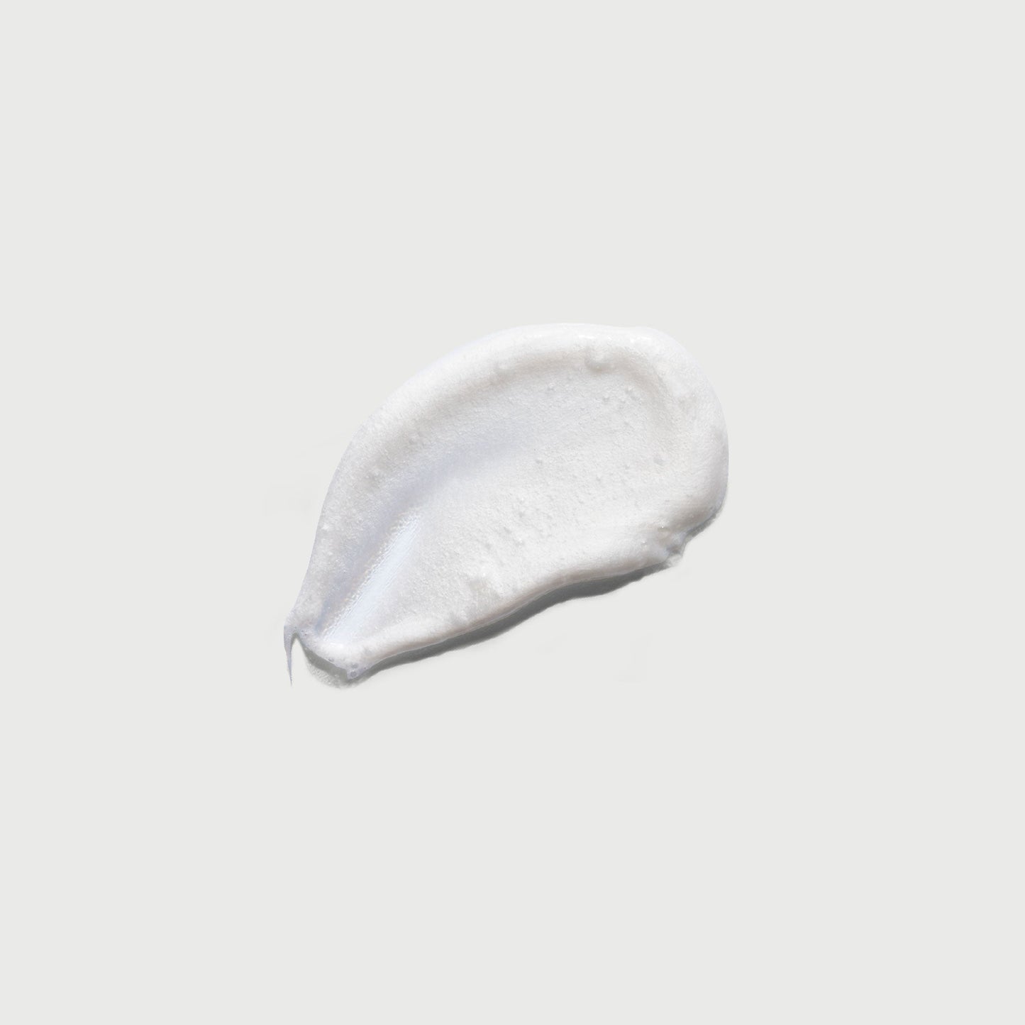 the-smoother-glycolic-acid-exfoliating-body-wash-r0 NATR-40002-Swatch-The-Smoother-Glycolic-Acid-Exfoliating-Body-Wash-bonebkgd.jpg