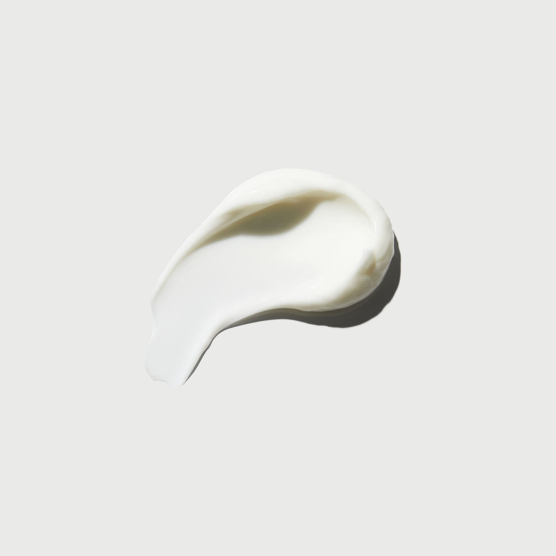 the-smoother-glycolic-acid-body-lotion-m0 NATR-40014-Swatch-The-Smoother-Glycolic-Acid-Body-Lotion-bonebkgd.jpg